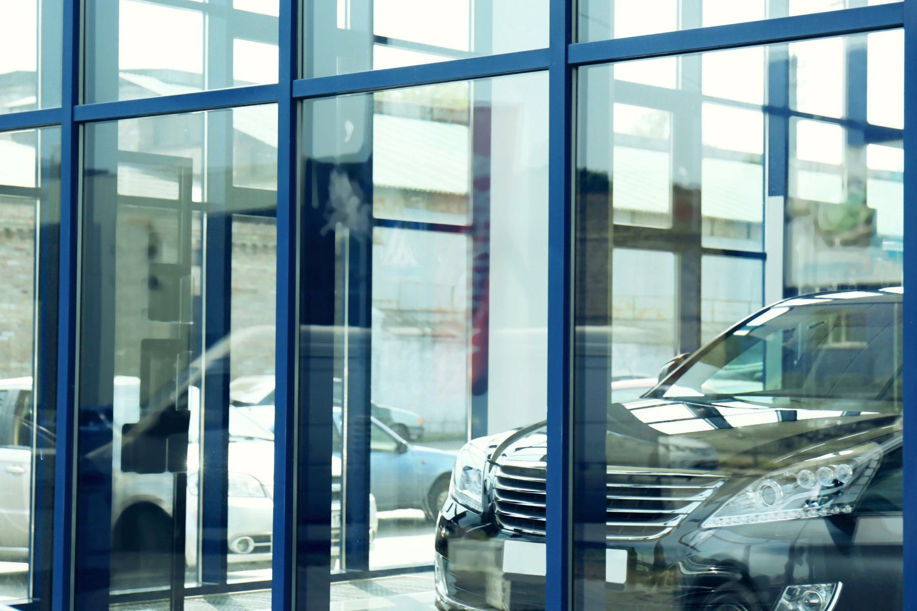 Auto dealership showroom with one vehicle
